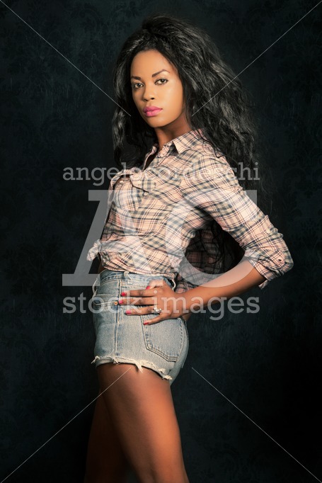 Beautiful Young Black Woman. Afro Model With Dark Background. Ca Angelo Cordeschi