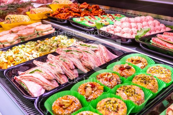 Butcher, Meat Department. Several Products Displayed In A Showca Angelo Cordeschi