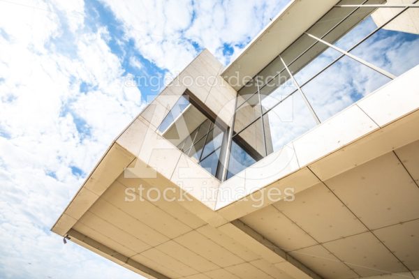 Detail Of A Modern Concrete Building With Glass Windows In The H Angelo Cordeschi