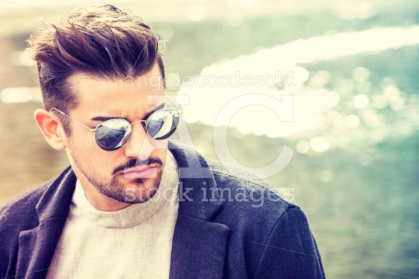 Handsome Stylish Man With Sunglasses And Modern Hairstyle And Be Angelo Cordeschi