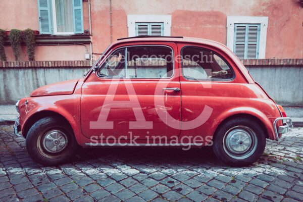 Old Compact Italian Car Fiat 500 Cinquecento Parked In The Histo Angelo Cordeschi