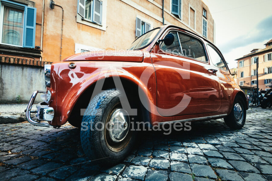 Old Compact Italian Car Fiat 500 Cinquecento Parked In The Histo Angelo Cordeschi