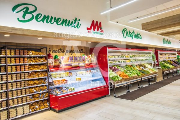 Shelves Of Products For Sale Inside A Supermarket Shopping Mall Angelo Cordeschi