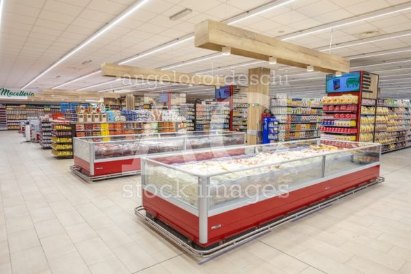 Shelves Of Products For Sale Inside A Supermarket Shopping Mall Angelo Cordeschi