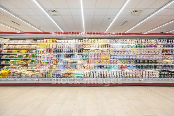 Shelves Of Products For Sale Inside A Supermarket Shopping Mall Angelo Cordeschi