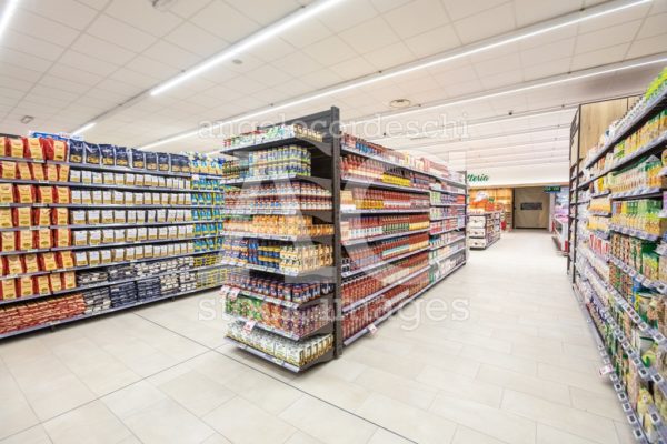 Shelves of products for sale inside a supermarket shopping mall - Angelo Cordeschi