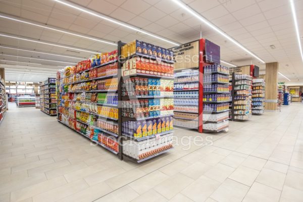 Shelves Of Products For Sale Inside A Supermarket Shopping Mall Angelo Cordeschi