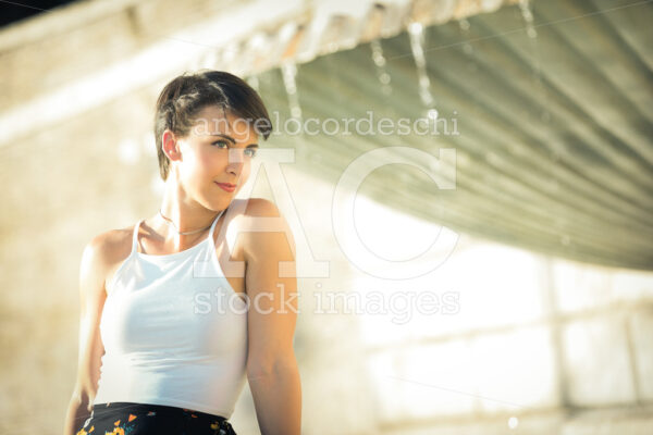 Young Woman With Black Short Hair Outdoors Happy And Smiling. Bl Angelo Cordeschi